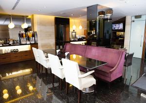 TV a/nebo společenská místnost v ubytování Royal Group Hotel Chun Shan Branch