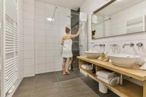 Et badeværelse på Kronhofer – Apartments & Erlebnis-Imkerei + 57 billeder