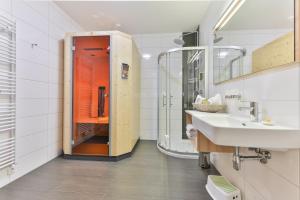 Kupatilo u objektu Kronhofer – Apartments & Erlebnis-Imkerei