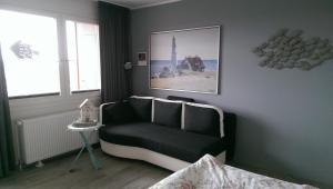 Posezení v ubytování Ferienwohnung Osterdeich
