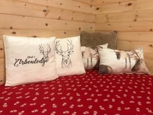 Rúm í herbergi á Eberl´s Zirbenlodge