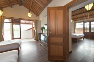 Postel nebo postele na pokoji v ubytování An Bang Beach Villa