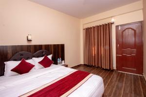 Uma cama ou camas num quarto em The Country Yard