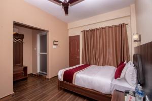 Uma cama ou camas num quarto em The Country Yard