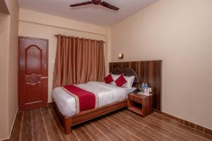 Uma cama ou camas num quarto em The Country Yard