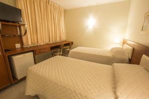 Cama ou camas em um quarto em Hotel Ipanema de Sorocaba