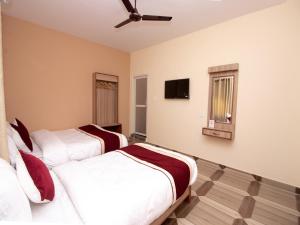 Uma cama ou camas num quarto em The Country Yard