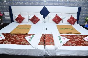 Postel nebo postele na pokoji v ubytování Rightchoicehotels