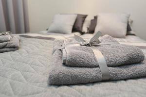 Posteľ alebo postele v izbe v ubytovaní Apartament Wróbelkowo