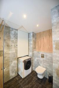 Kúpeľňa v ubytovaní Apartament Wróbelkowo