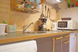 Kuchyň nebo kuchyňský kout v ubytování Appartment Pinar