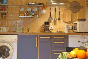 Kuchyň nebo kuchyňský kout v ubytování Appartment Pinar