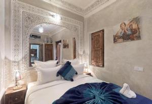 Postel nebo postele na pokoji v ubytování Riad Sania By Ghali + 37 fotografií