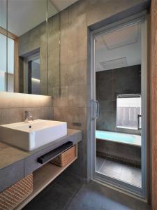 Ванна кімната в Komatsu Residences