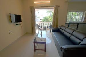 TV a/nebo společenská místnost v ubytování Resort Paloma De Goa