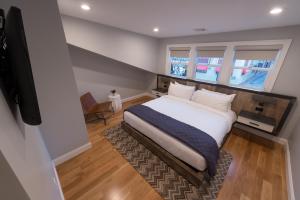 En eller flere senge i et værelse på The Newport Lofts - Brick Market Place