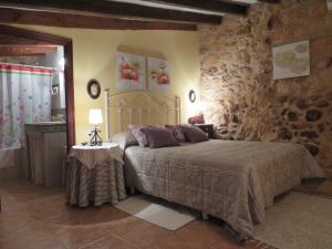 En eller flere senge i et værelse på Agroturismo Finca Son Pieras