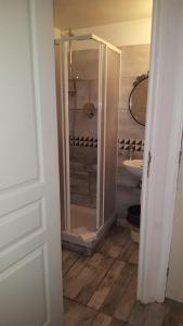a bathroom with a shower and a sink at Villa Azur Cap d'Ail in Cap d'Ail