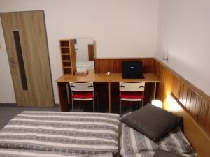 Posteľ alebo postele v izbe v ubytovaní Prázdninový dům Na Panorámě