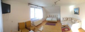 Postel nebo postele na pokoji v ubytování Rekreačný dom Ruža