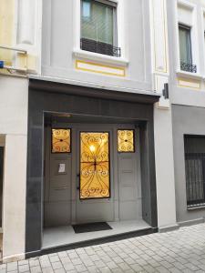 a pair of doors on a building at Kriemhilde Dependance in Worms