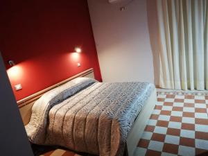 Postel nebo postele na pokoji v ubytování B&B Enjoy Ercolano + 17 fotografií