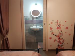 Kúpeľňa v ubytovaní B&B La Perla Bianca + 20 fotografií