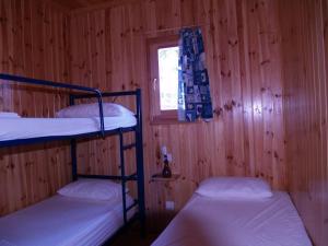Llit o llits en una habitació de Camping Playa América