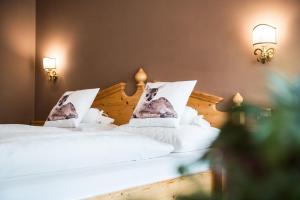 Posteľ alebo postele v izbe v ubytovaní Alpenhotel Plaza
