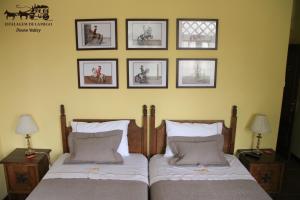 En eller flere senge i et værelse på Camping Lamego Douro Valley