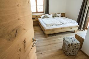 A bed or beds in a room at AusZeit
