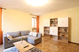 a living room with a couch and a table at La Dimora sul colle in Potenza Picena