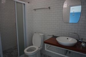 a bathroom with a toilet and a sink at Chill Days @ Koh Larn in Ko Larn