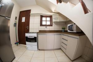 Η κουζίνα ή μικρή κουζίνα στο Pousada Brisa do Mar +28 φωτογραφίες