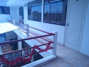 a view from the balcony of a building with a pool at Hospedaje Golden Inn in Camaná