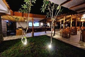 Majoituspaikan The Nalaya Hotel & Resto ravintola tai vastaava paikka