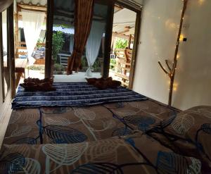Postel nebo postele na pokoji v ubytování Haad Chao Phao Resort
