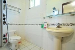 Koupelna v ubytování Jing Dian Homestay