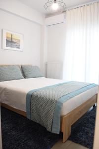 Posteľ alebo postele v izbe v ubytovaní Heliconia deluxe Apt Must
