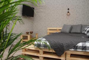 Кровать или кровати в номере Гостевой Дом Тверской