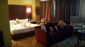 Posezení v ubytování Oasis Hotel
