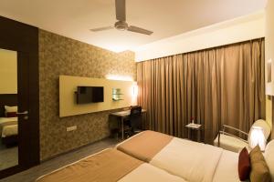 Cama ou camas em um quarto em Sentosa Resorts & Water Park