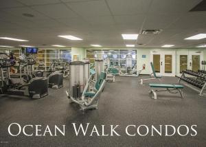 a gym with treadmills and machines in a room at Ocean Walk Resort Magnificent Ocean Front View in Daytona Beach