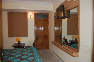 Postel nebo postele na pokoji v ubytování Hotel Prestige