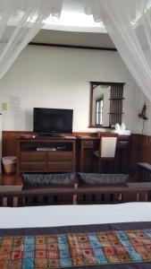 TV a/nebo společenská místnost v ubytování PingPhuPlace Smart Check-in