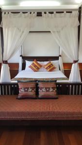 Postel nebo postele na pokoji v ubytování Ping Phu Place