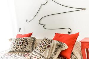 Postel nebo postele na pokoji v ubytování Vesuvius a Mezzocannone