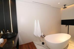 Koupelna v ubytování Felissimo Exclusive Hotel