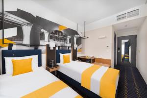 Voodi või voodid majutusasutuse D8 Hotel toas