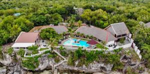 an aerial view of a house with a swimming pool at Cliffside Resort in Panglao Island